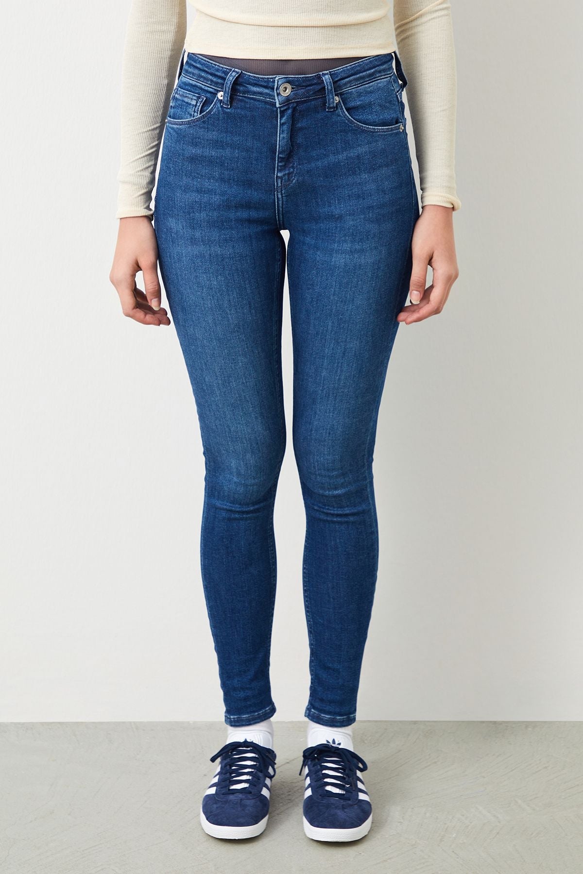 Front view of Sira Skinny Fit Dark Blue Women's Jeans, a timeless classic.