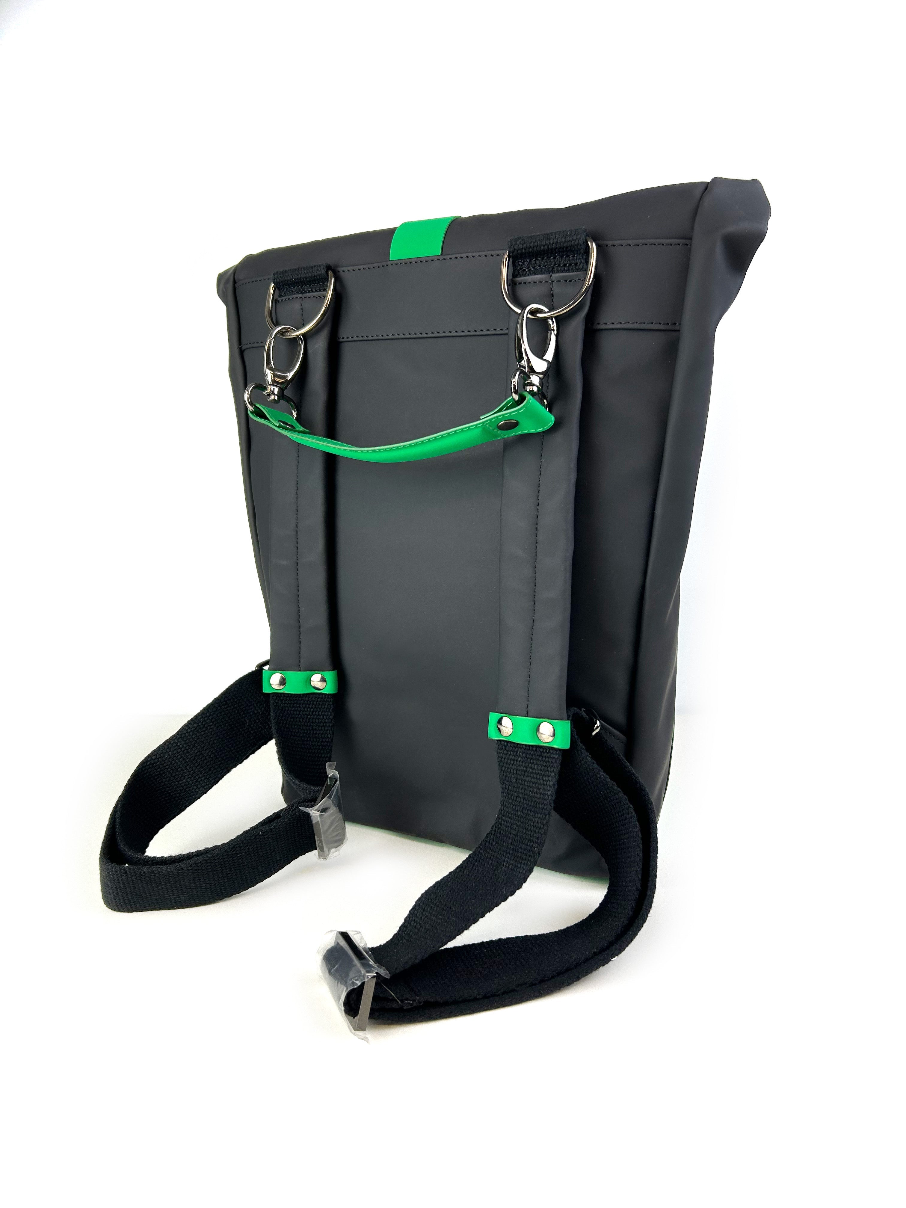 Reverse side of HADLEY Waterproof Backpack in green, showing padded leather shoulder straps and anti-slip cotton lining