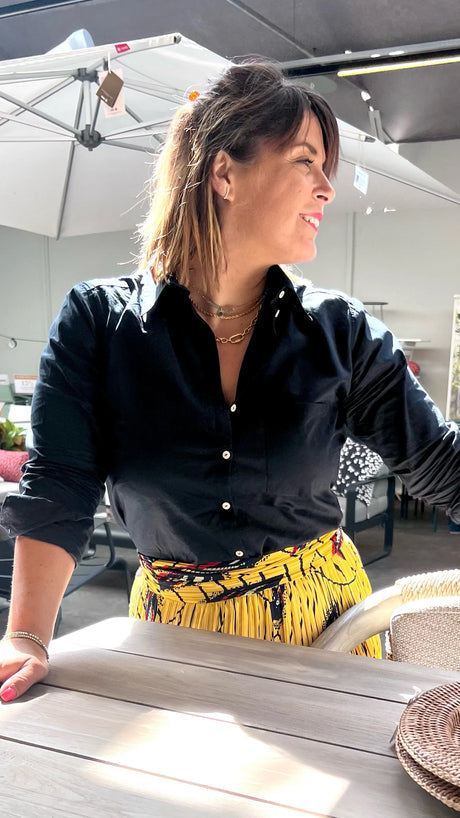 Beautiful Women wearing a midnight blue Coachella Shirt