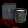 HAVANA LOVERS candle, featuring bergamot, lemon zest, jasmine, violet, sandalwood, musk, and tonka bean notes. Handmade in Geneva in an elegant black glass container.