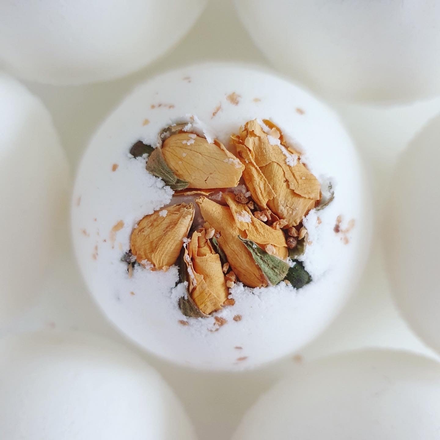 Relief Bath Bomb with lemongrass and sandalwood, all natural bath bomb, handmade and decorated with dried rose buds.