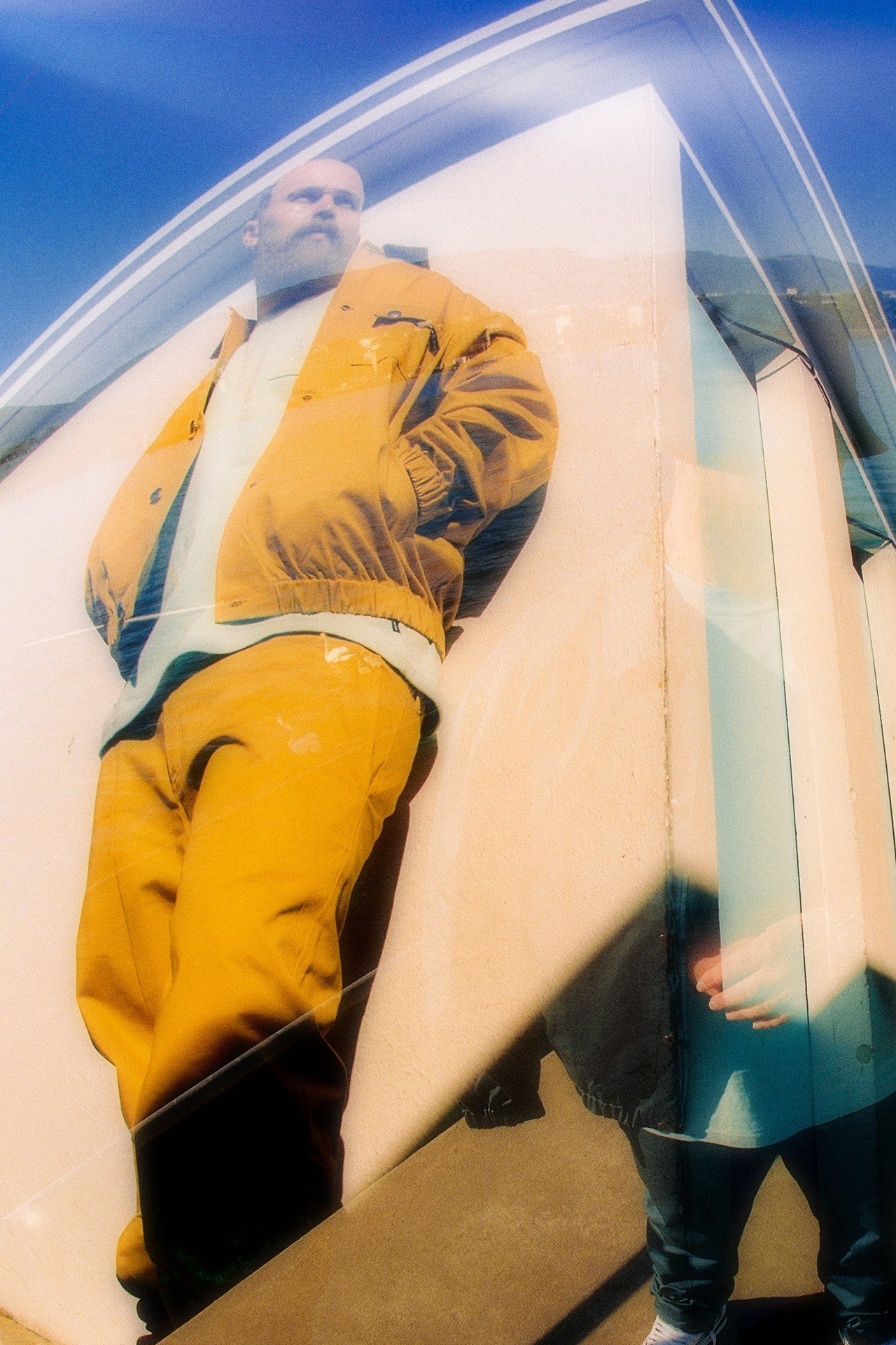 Stylish Men's Outfit with Lightweight Patch Jacket in Mustard Yellow and yellow pants.